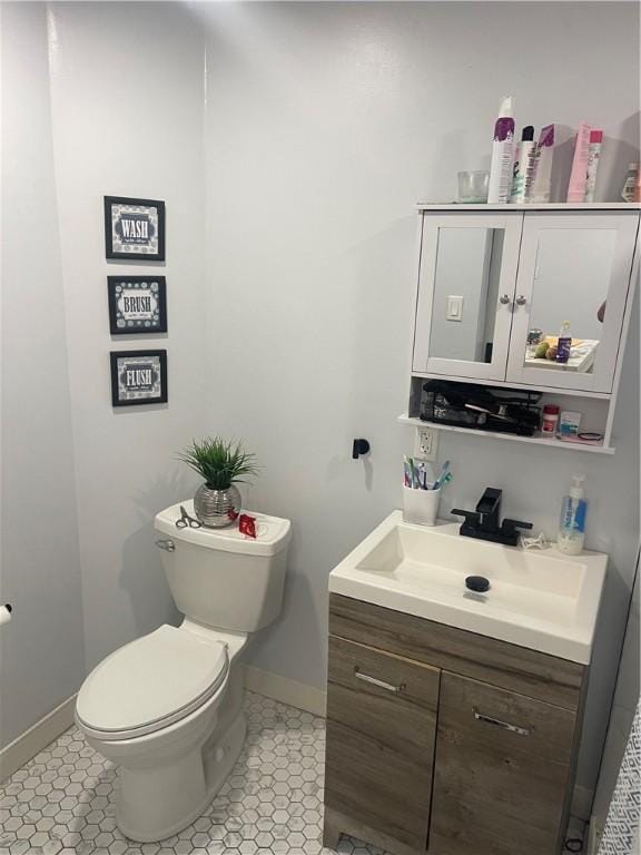 195 Bellevue Ave, Providence, RI 02907 - half bathroom featuring vanity and tile patterned floors