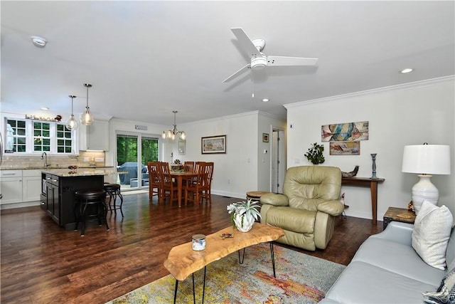 107 Pottersville Rd, Little Compton, RI 02837 - living room featuring ornamental molding, a ceiling fan, a chandelier, dark wood-style flooring, and recessed lighting