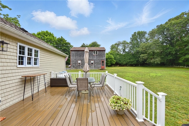 107 Pottersville Rd, Little Compton, RI 02837 - wooden terrace with outdoor dining space, a yard, and an outdoor structure