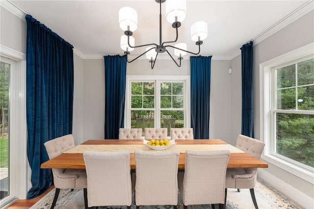 64 Knight View Dr, West Greenwich, RI 02817 - dining area featuring a chandelier, healthy amount of natural light, crown molding, and light wood-style floors