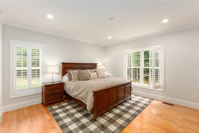 64 Knight View Dr, West Greenwich, RI 02817 - bedroom with multiple windows, ornamental molding, light wood-type flooring, and recessed lighting