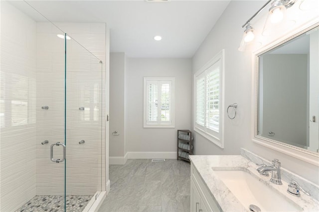 64 Knight View Dr, West Greenwich, RI 02817 - full bathroom featuring vanity, a stall shower, marble finish flooring, and recessed lighting