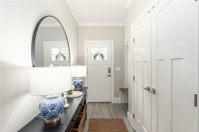 64 Knight View Dr, West Greenwich, RI 02817 - foyer entrance featuring ornamental molding and wood finished floors