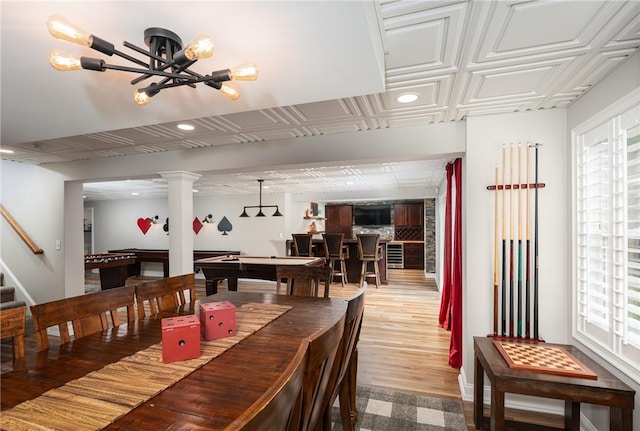 64 Knight View Dr, West Greenwich, RI 02817 - dining area featuring healthy amount of natural light, recessed lighting, pool table, stairway, and wood finished floors