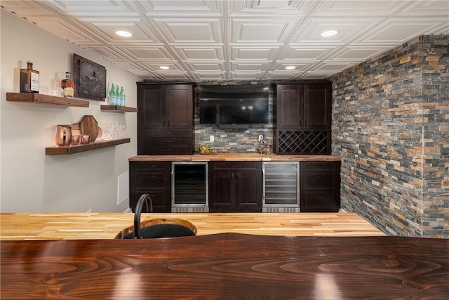 64 Knight View Dr, West Greenwich, RI 02817 - indoor wet bar featuring beverage cooler, an ornate ceiling, and recessed lighting