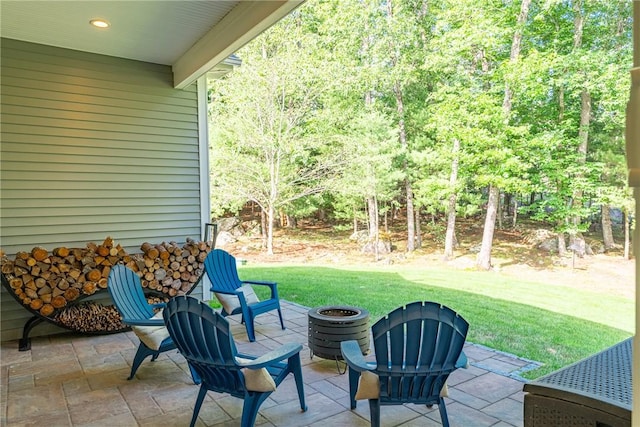 64 Knight View Dr, West Greenwich, RI 02817 - view of patio with a fire pit
