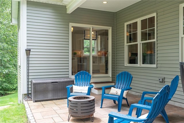 64 Knight View Dr, West Greenwich, RI 02817 - view of patio with an outdoor fire pit