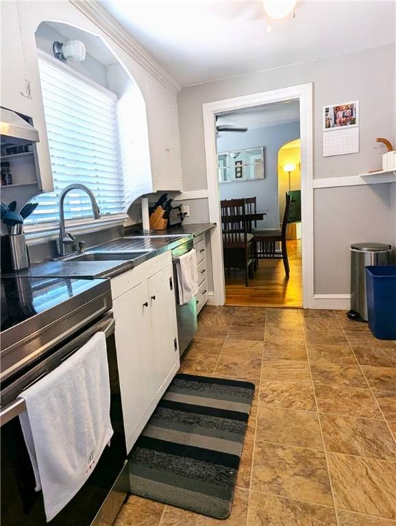 125 Roger Williams, East Providence, RI 02916 - kitchen with stainless steel appliances, white cabinetry, and dark countertops