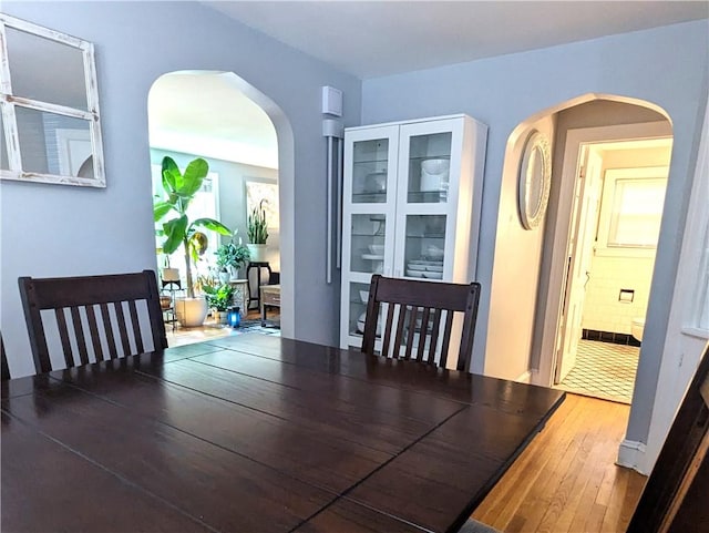 125 Roger Williams, East Providence, RI 02916 - dining space featuring hardwood / wood-style floors and arched walkways