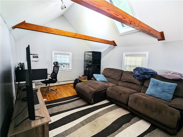 125 Roger Williams, East Providence, RI 02916 - living area with a skylight, wood finished floors, high vaulted ceiling, and an office area