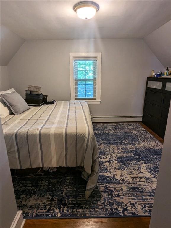 125 Roger Williams, East Providence, RI 02916 - bedroom with lofted ceiling, wood finished floors, and a baseboard radiator