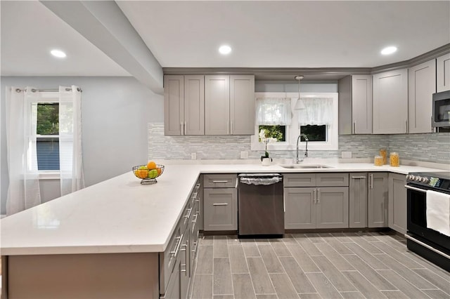 12 Leddy Rd, Cumberland, RI 02864 - kitchen featuring appliances with stainless steel finishes, gray cabinets, tasteful backsplash, and recessed lighting