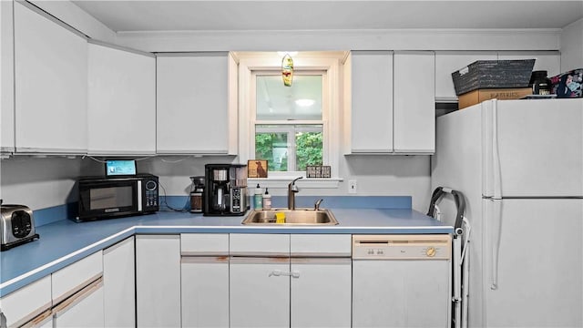74 Algonquin Rd, East Providence, RI 02916 - kitchen with white appliances, white cabinets, and light countertops