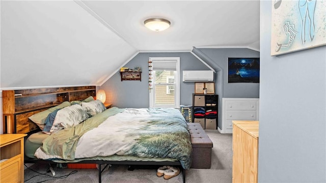 74 Algonquin Rd, East Providence, RI 02916 - bedroom with a wall unit AC, vaulted ceiling, and carpet floors