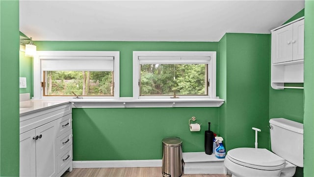 74 Algonquin Rd, East Providence, RI 02916 - bathroom featuring plenty of natural light, vanity, and wood finished floors