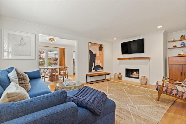 33 Arbor Dr Unit 27, Providence, RI 02908 - living room featuring wood finished floors, crown molding, a lit fireplace, and recessed lighting