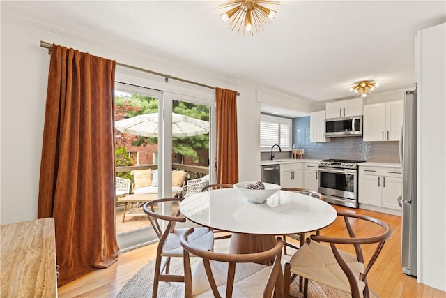 33 Arbor Dr Unit 27, Providence, RI 02908 - dining area featuring light wood-type flooring