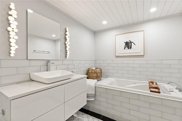 33 Arbor Dr Unit 27, Providence, RI 02908 - bathroom featuring vanity, a bath, recessed lighting, and wood ceiling