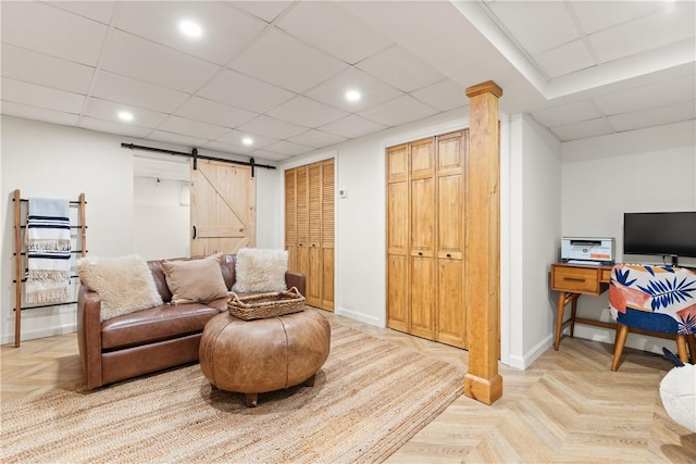 33 Arbor Dr Unit 27, Providence, RI 02908 - sitting room with a barn door, a drop ceiling, and recessed lighting