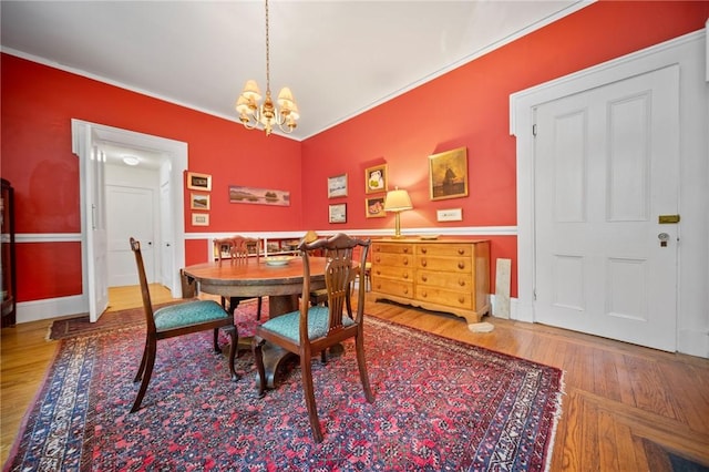 33 Kay St, Newport, RI 02840 - dining space featuring a chandelier, wood finished floors, and ornamental molding