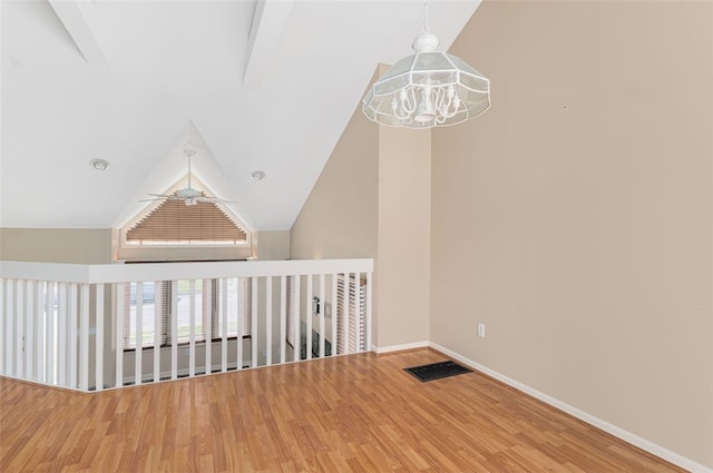 151 Mohawk Trl, Cranston, RI 02921 - bonus room with wood finished floors, high vaulted ceiling, a chandelier, and ceiling fan