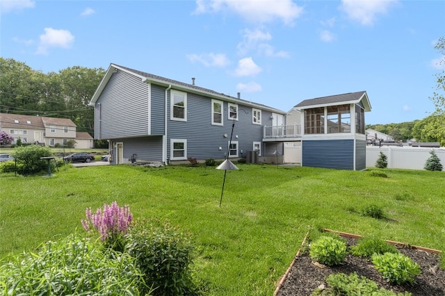 151 Mohawk Trl, Cranston, RI 02921 - rear view of property with a sunroom