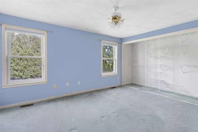 151 Mohawk Trl, Cranston, RI 02921 - carpeted empty room featuring baseboards