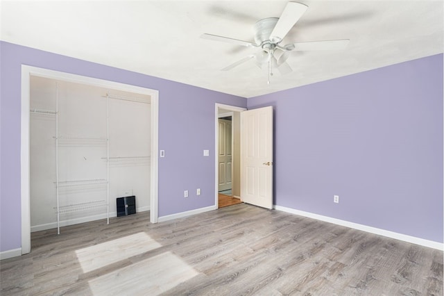 151 Mohawk Trl, Cranston, RI 02921 - unfurnished bedroom with wood finished floors, a closet, and ceiling fan