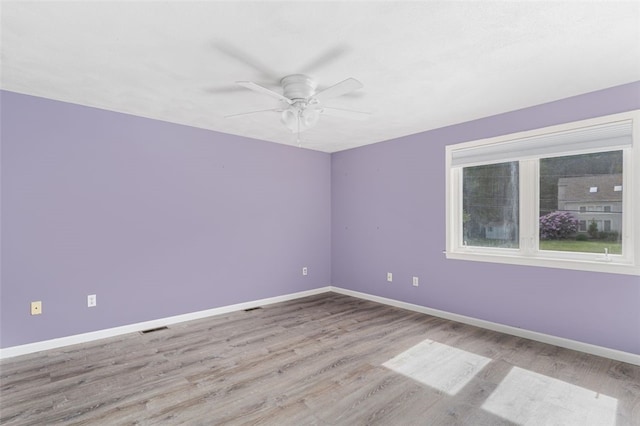 151 Mohawk Trl, Cranston, RI 02921 - spare room with wood finished floors and ceiling fan