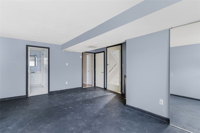 151 Mohawk Trl, Cranston, RI 02921 - spare room with baseboards and concrete flooring