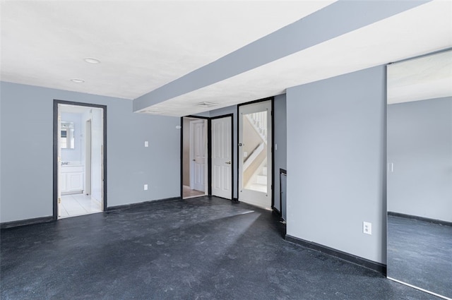 151 Mohawk Trl, Cranston, RI 02921 - spare room with baseboards and concrete flooring