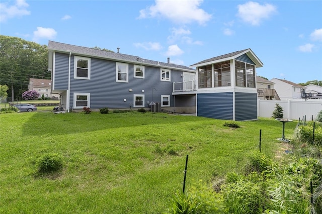 151 Mohawk Trl, Cranston, RI 02921 - rear view of property with a sunroom