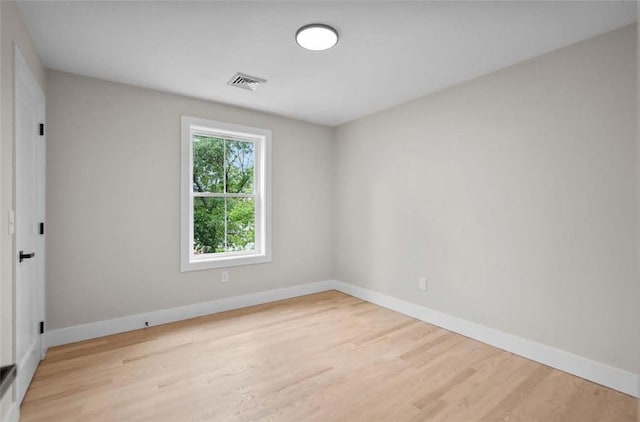 129 Stanwood St, Providence, RI 02907 - spare room with wood finished floors and baseboards
