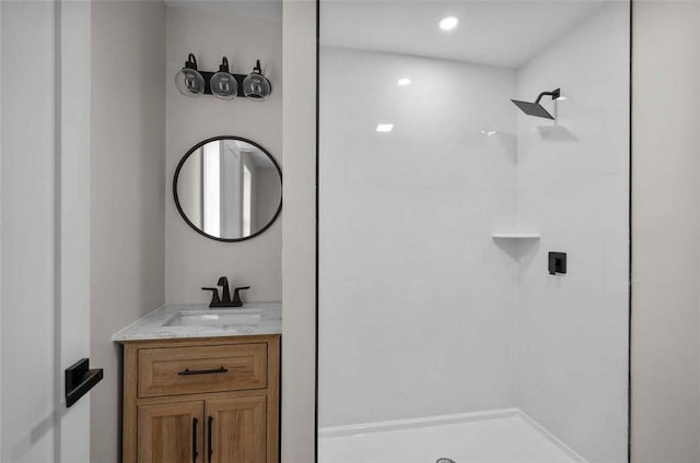 129 Stanwood St, Providence, RI 02907 - full bathroom featuring a tile shower and vanity