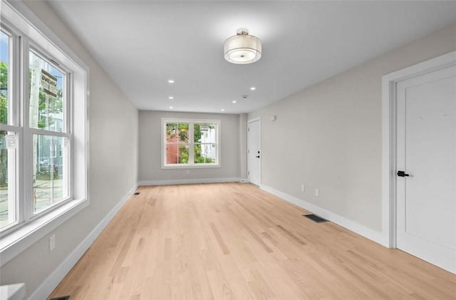 129 Stanwood St, Providence, RI 02907 - unfurnished room with light wood-style flooring and recessed lighting