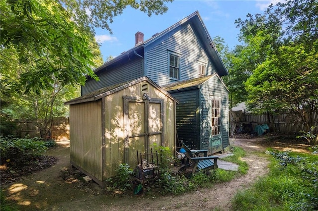 52 Spring St, South Kingstown, RI 02879 - view of shed featuring a fenced backyard