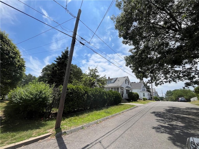 16 Winthrop St, Cranston, RI 02910 - view of asphalt road featuring curbs