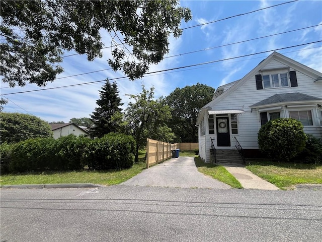 16 Winthrop St, Cranston, RI 02910 - view of front facade with asphalt driveway
