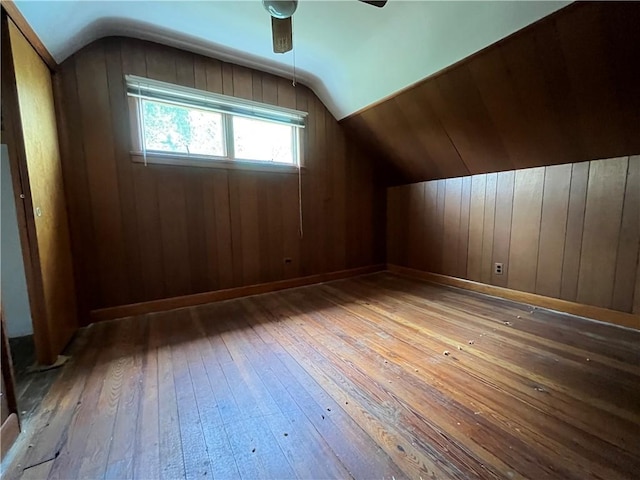 16 Winthrop St, Cranston, RI 02910 - additional living space featuring hardwood / wood-style flooring, vaulted ceiling, ceiling fan, and wooden walls