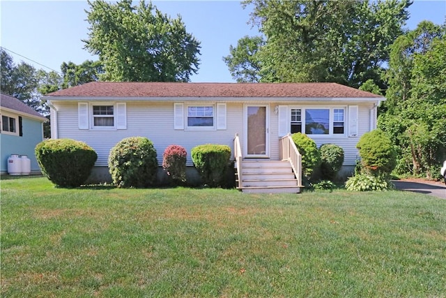 27 Louise Dr, Tiverton, RI 02878 - view of front facade featuring a front lawn