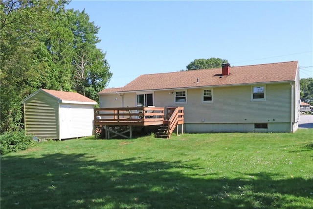 27 Louise Dr, Tiverton, RI 02878 - rear view of house featuring a shed, a deck, and a lawn