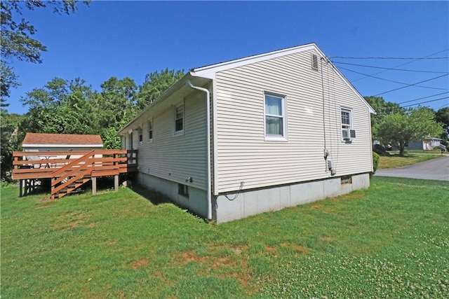 27 Louise Dr, Tiverton, RI 02878 - view of side of home featuring a deck, a yard, and cooling unit