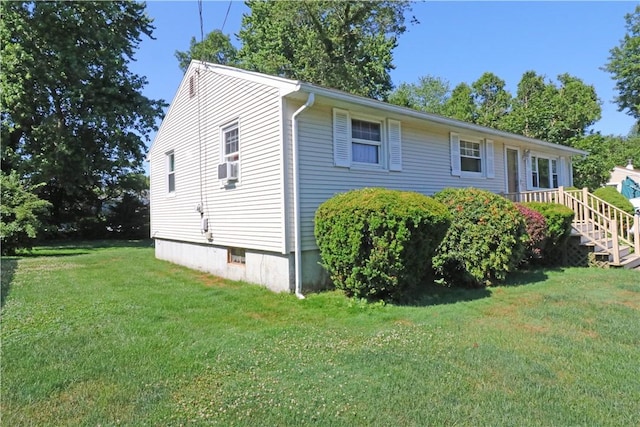27 Louise Dr, Tiverton, RI 02878 - view of front facade with a front lawn and cooling unit