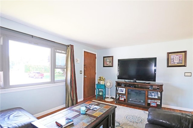 27 Louise Dr, Tiverton, RI 02878 - living area featuring baseboards and wood finished floors