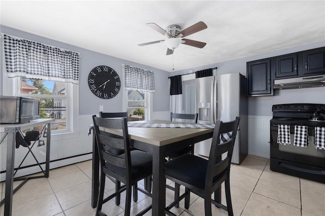 40 W Cole St, Pawtucket, RI 02861 - dining room featuring a wainscoted wall, a ceiling fan, light tile patterned flooring, and a baseboard heating unit