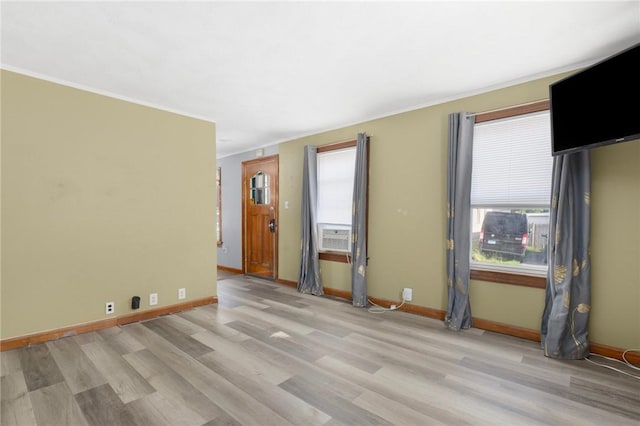 40 W Cole St, Pawtucket, RI 02861 - empty room featuring light wood finished floors and crown molding