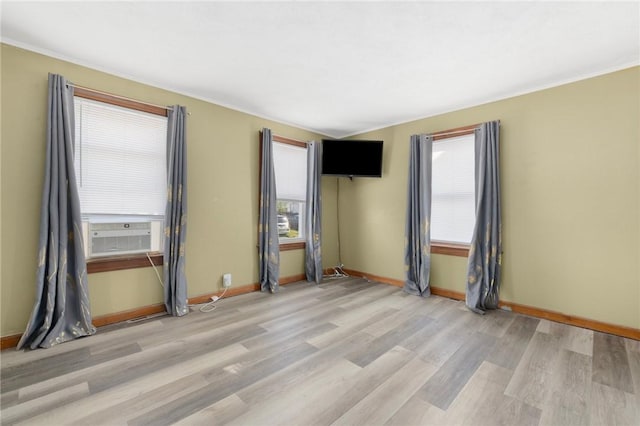 40 W Cole St, Pawtucket, RI 02861 - spare room with cooling unit, light wood finished floors, plenty of natural light, and crown molding