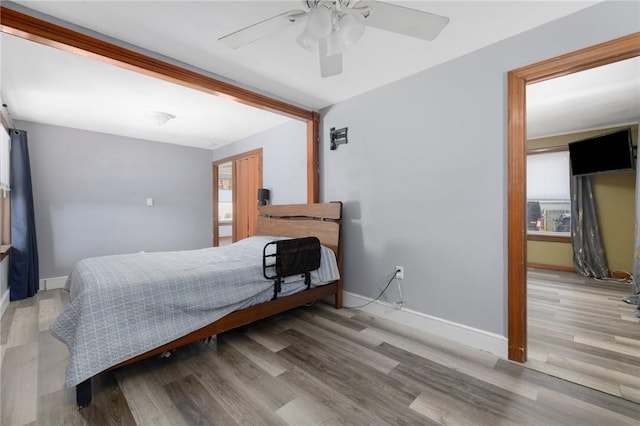 40 W Cole St, Pawtucket, RI 02861 - bedroom with wood finished floors, ceiling fan, and multiple windows