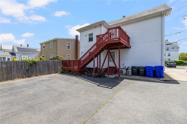 40 W Cole St, Pawtucket, RI 02861 - rear view of property with stairway and a wooden deck