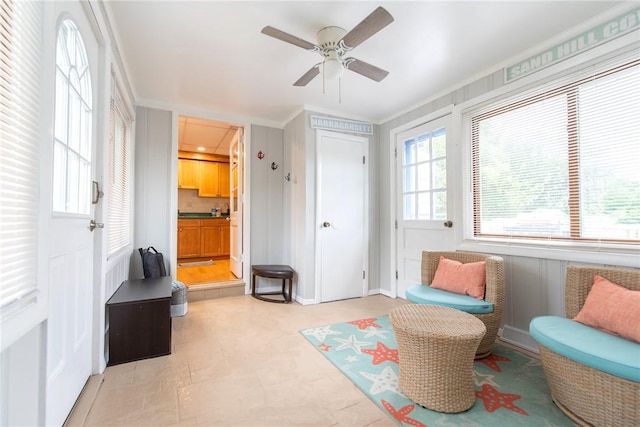 130 Knowlesway Ext, Narragansett, RI 02882 - sitting room featuring ornamental molding and a ceiling fan
